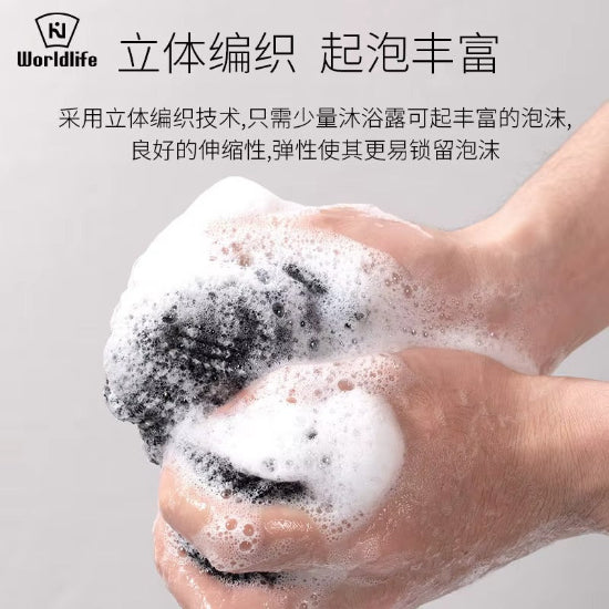 Hand using a soapy scrubber with text about Worldlife product features on a gray background